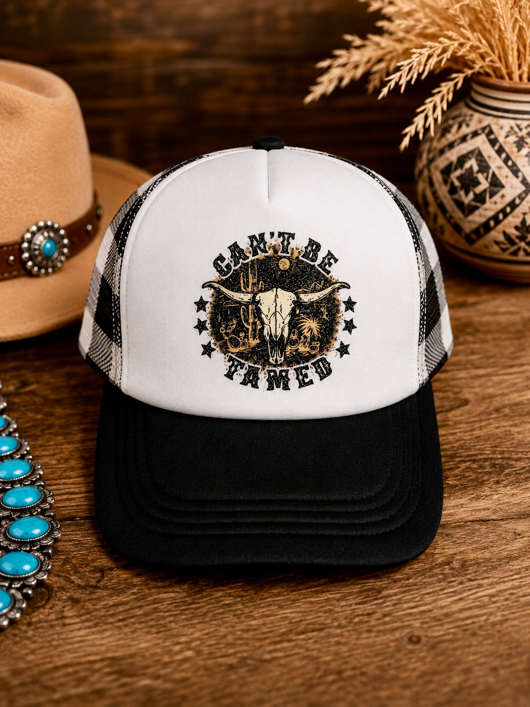Can’t Be Tamed Trucker Hat